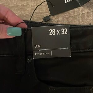Men’s slim fit black jeans. Unworn with tags still attached.